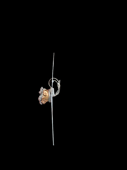 Sideview of silver colored lever back dangle style earrings 